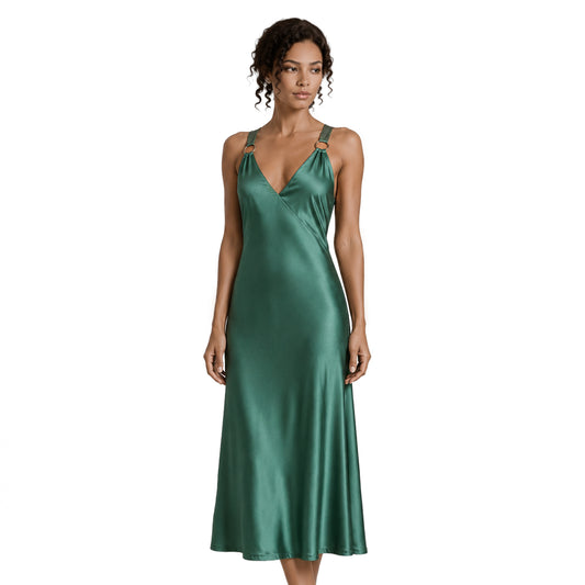 Model wearing an emerald green shimmer midi dress with a deep V-neckline, wrap-style bodice and gold-tone ring straps