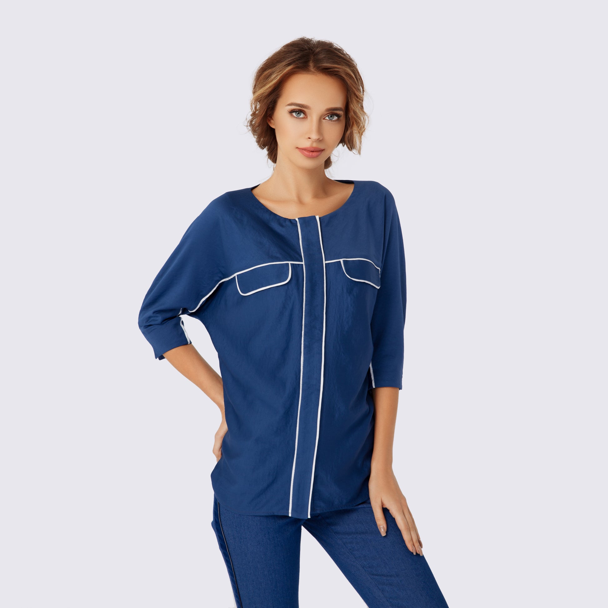 Navy blue loose blouse with white details
