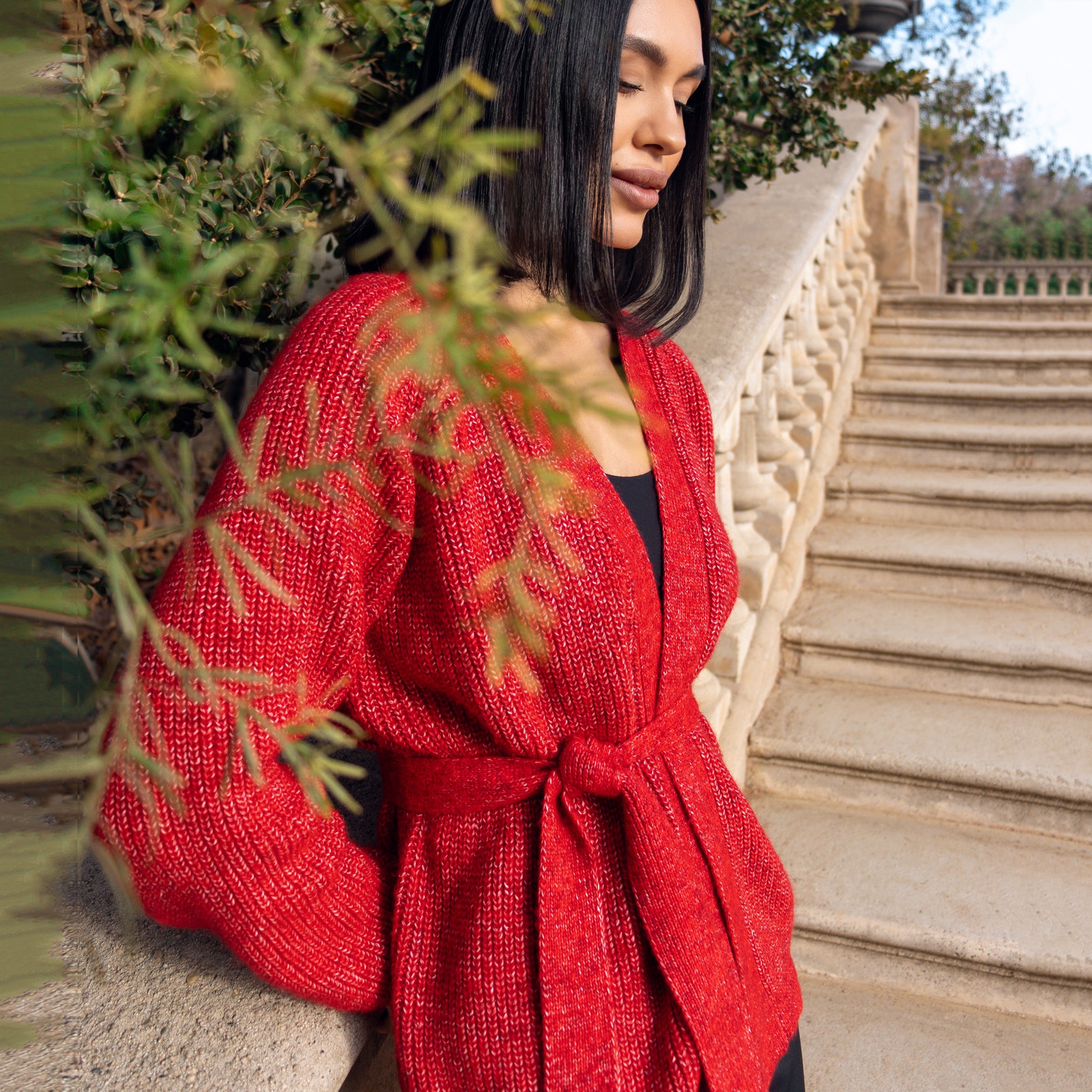 Red knitted cardigan with belt